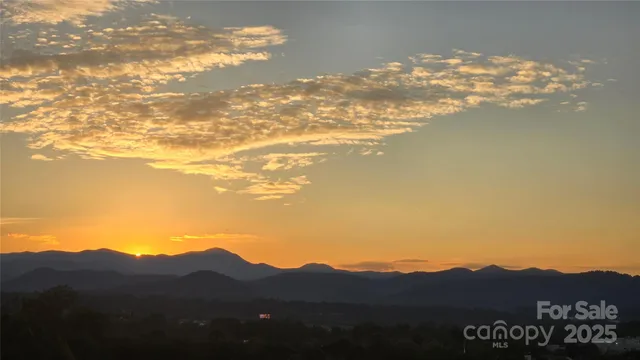 a view of lake with mountain