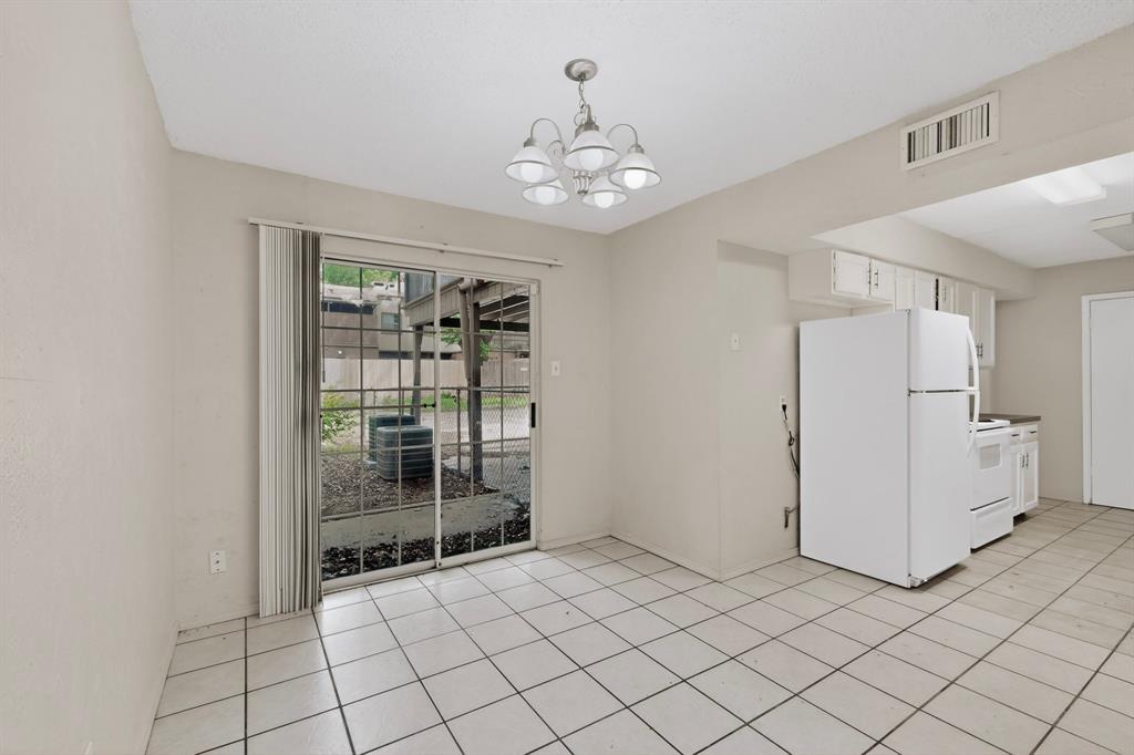 703 East Shady Grove Road Irving, TX 75060 - Photo 11 of 40 a view of an empty room and window