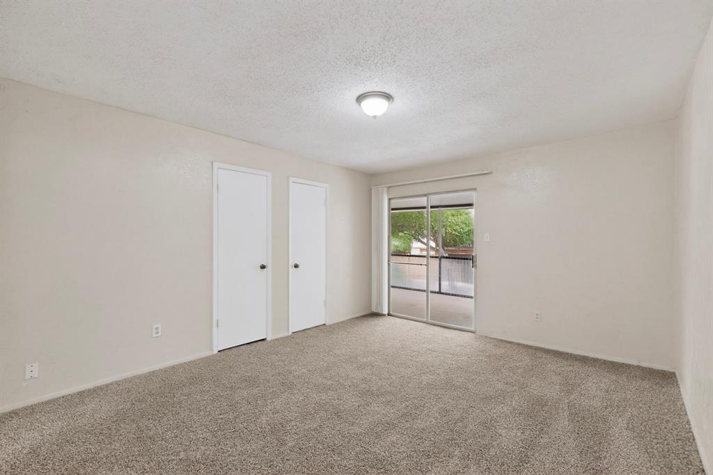 703 East Shady Grove Road Irving, TX 75060 - Photo 20 of 40 a view of an empty room with a window