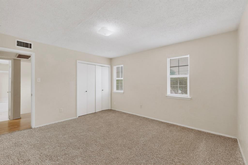 703 East Shady Grove Road Irving, TX 75060 - Photo 28 of 40 a view of an empty room with a window