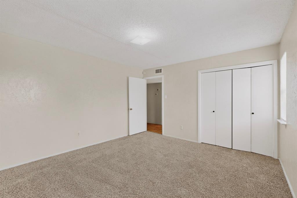 703 East Shady Grove Road Irving, TX 75060 - Photo 30 of 40 a view of an empty room and closet area