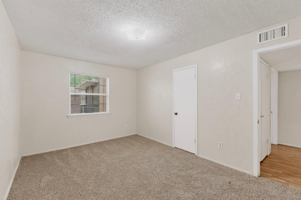 703 East Shady Grove Road Irving, TX 75060 - Photo 34 of 40 a view of an empty room with a window