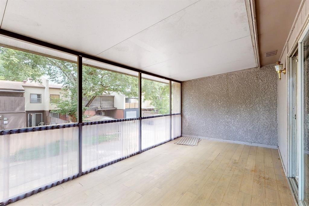 703 East Shady Grove Road Irving, TX 75060 - Photo 38 of 40 an empty room with sliding glass door
