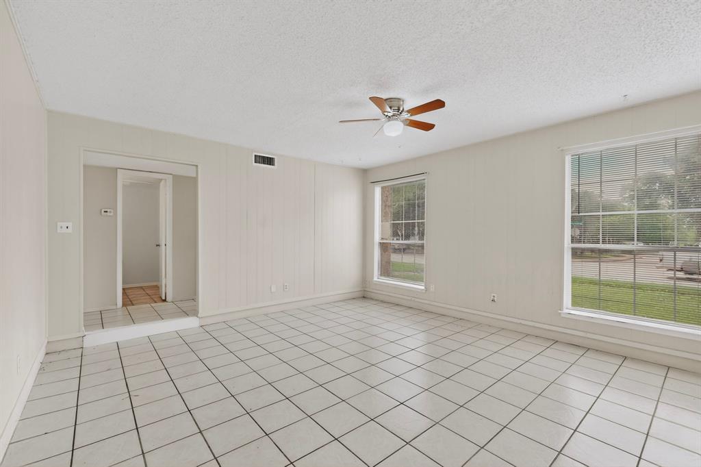 703 East Shady Grove Road Irving, TX 75060 - Photo 4 of 40 a view of an empty room and window