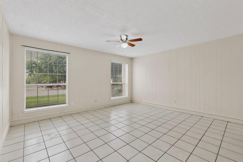 703 East Shady Grove Road Irving, TX 75060 - Photo 5 of 40 a view of an empty room with a window