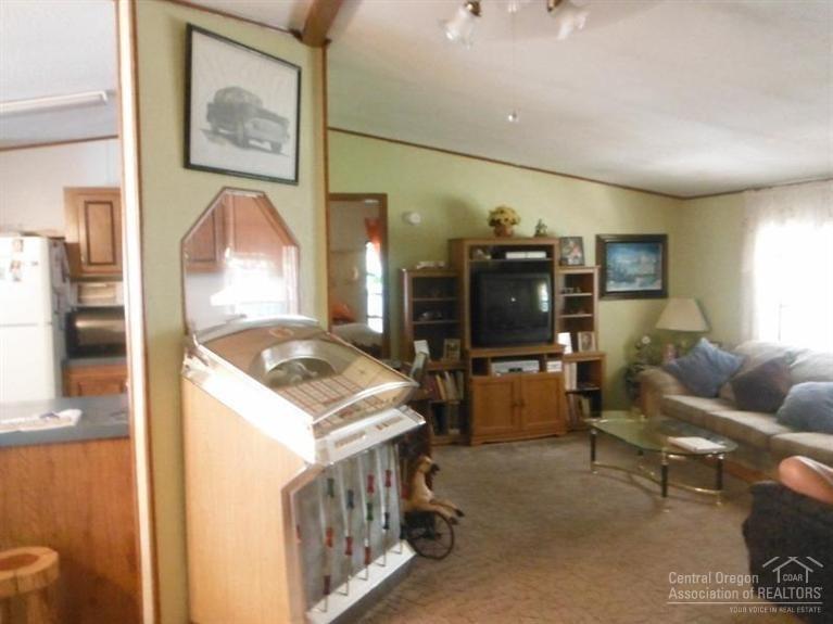 249 Kaehn Road Crescent, OR 97733 - Photo 4 of 25 Living room has a certified wood stove,