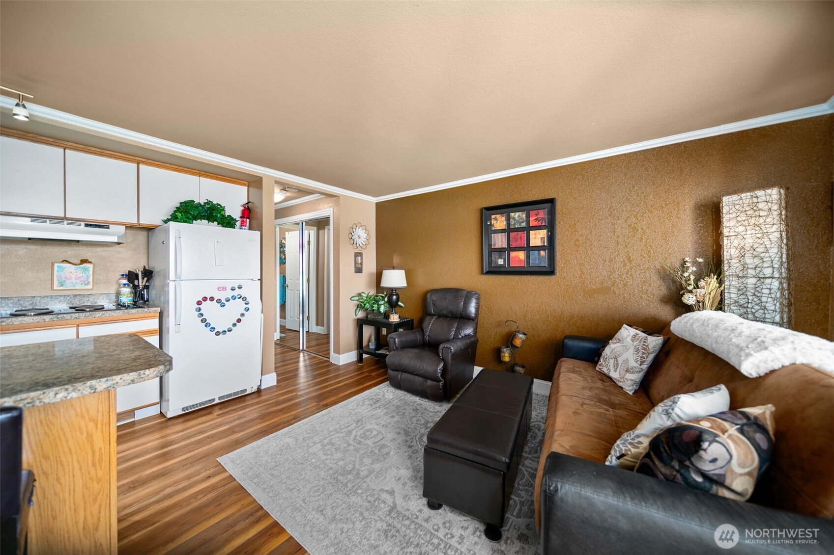 8903 Crescent Bar Road Northwest, Unit 101 Quincy, WA 98848 - Photo 15 of 40 a living room with furniture and a couch