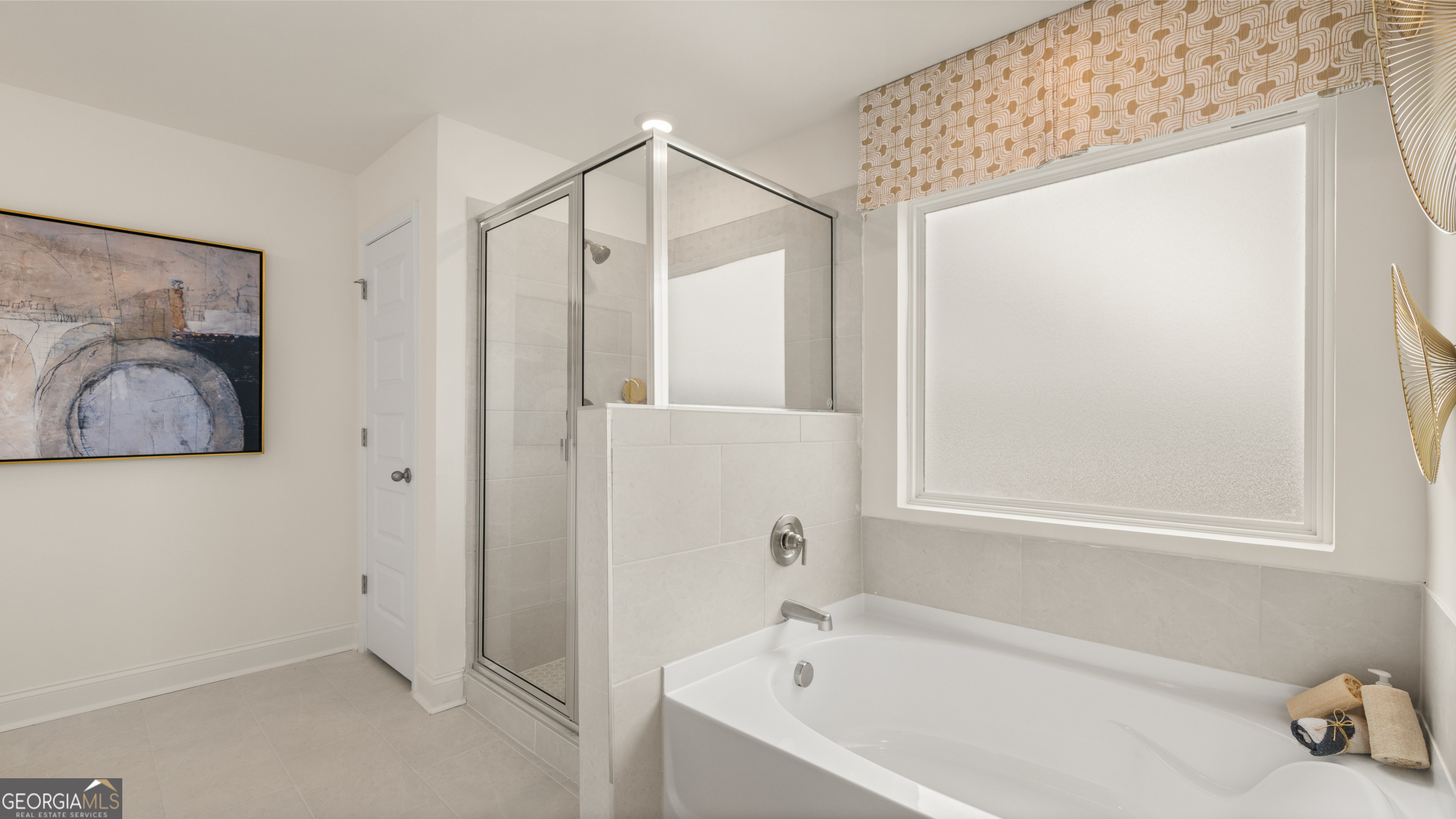1624 Bernard Court Hampton, GA 30228 - Photo 50 of 75 a bathroom with a bathtub and a shower