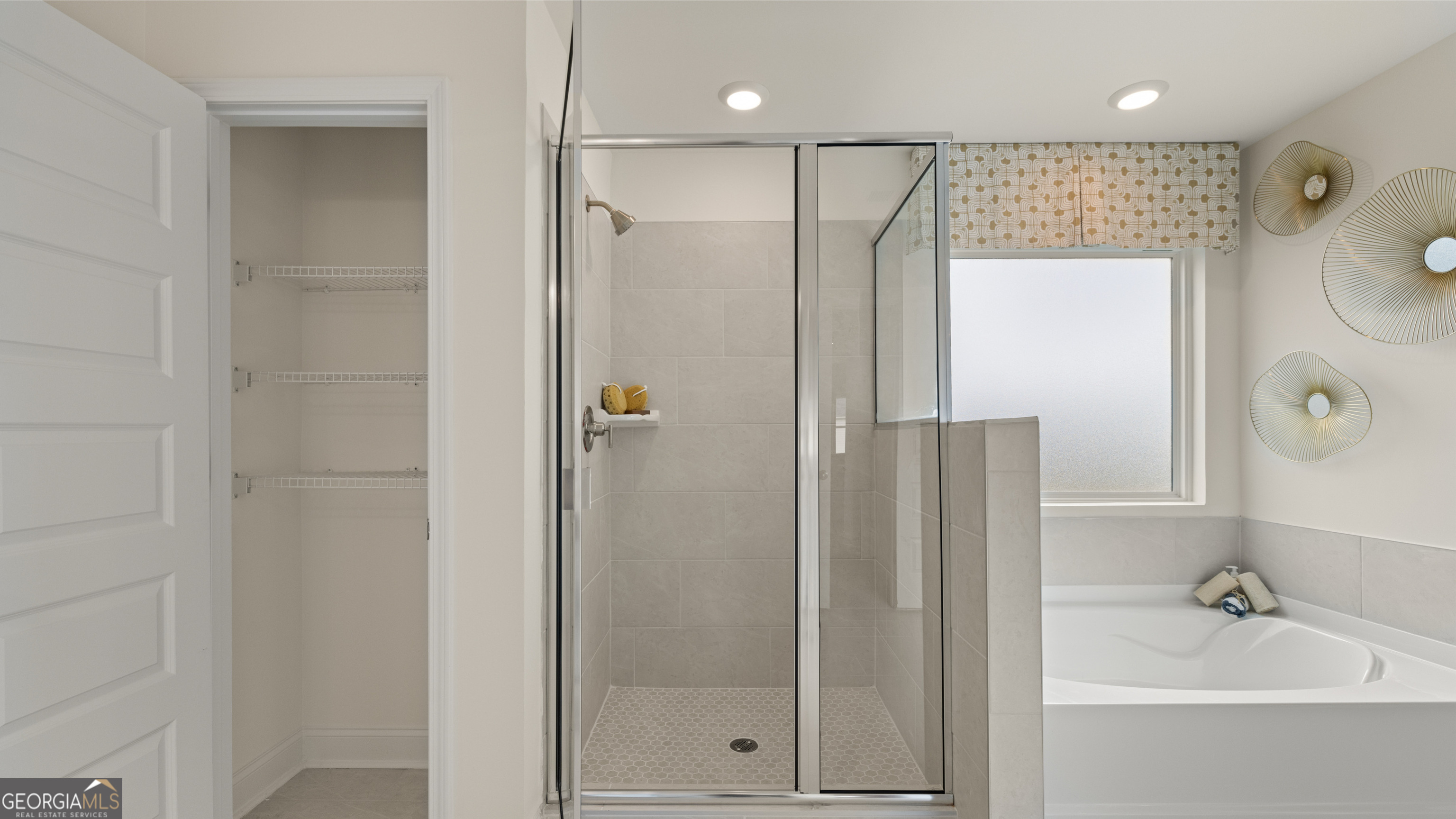 1624 Bernard Court Hampton, GA 30228 - Photo 51 of 75 a bathroom with a shower and a sink