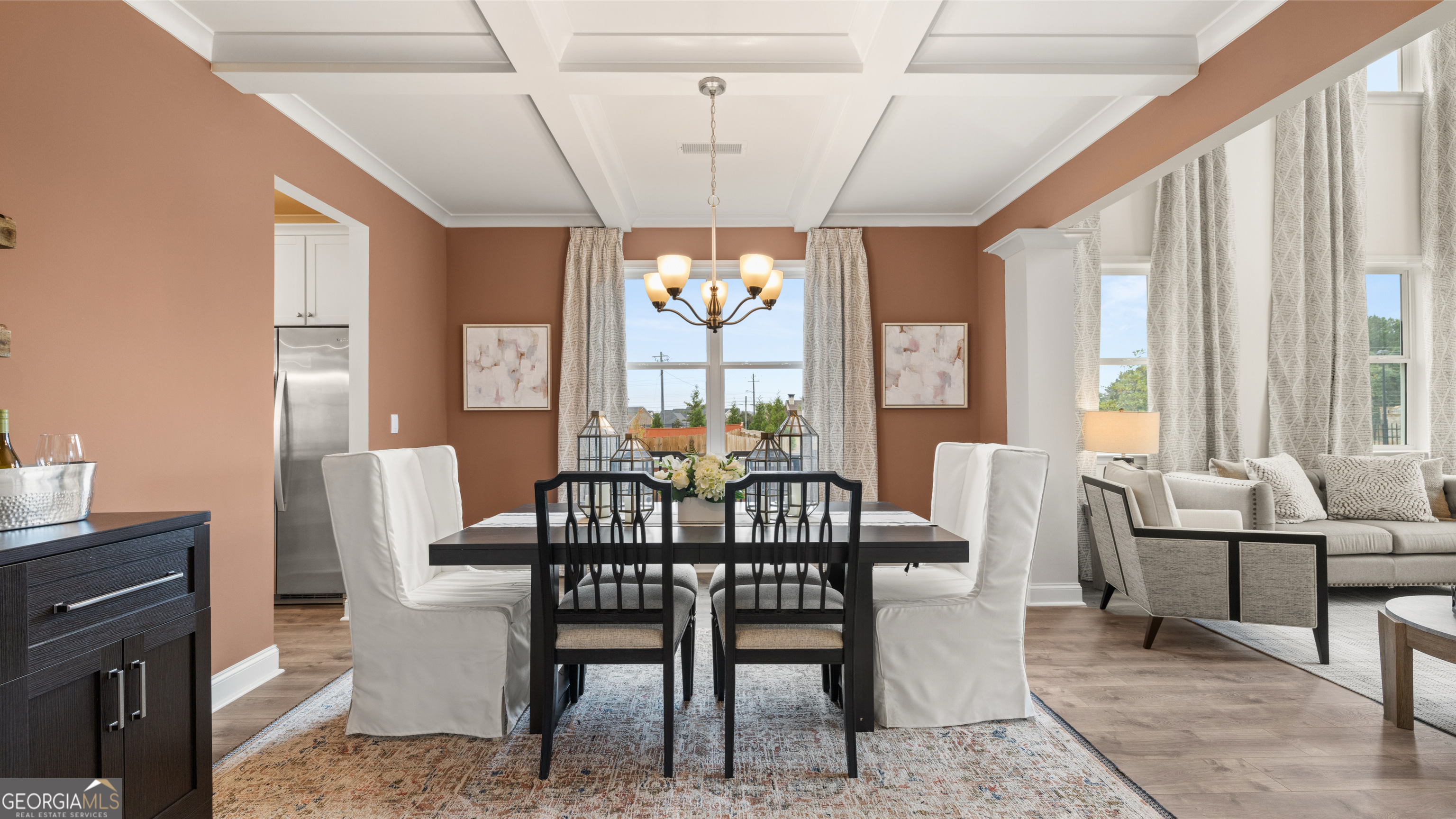 1624 Bernard Court Hampton, GA 30228 - Photo 10 of 75 a view of a dining room with furniture large windows and wooden floor