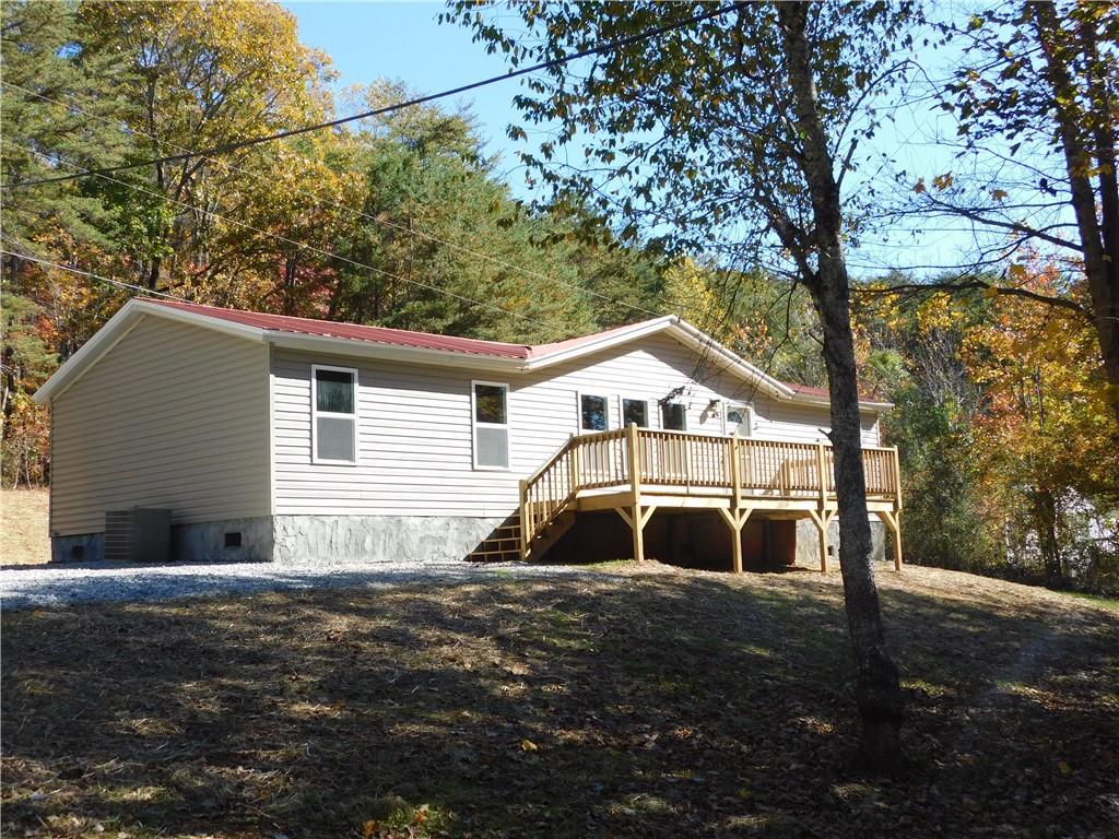 a house with trees in the background