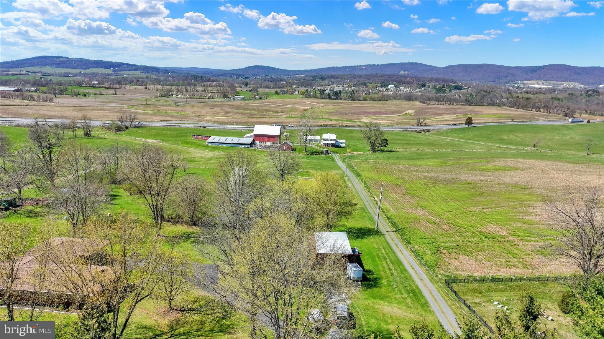 612 Capitol Hill Road Dillsburg, PA 17019 - Photo 2 of 11 a view of a lake with a mountain in the background