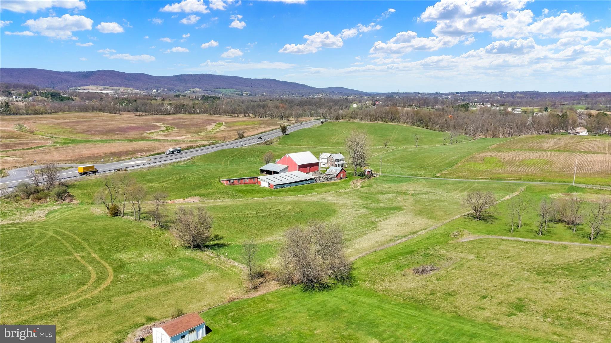 612 Capitol Hill Road Dillsburg, PA 17019 - Photo 3 of 11 a view of a lake with a mountain in the background