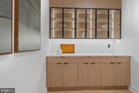 a bathroom with a toilet sink and shower