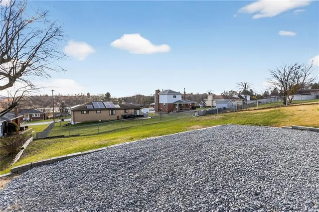 a view of a swimming pool and outdoor space