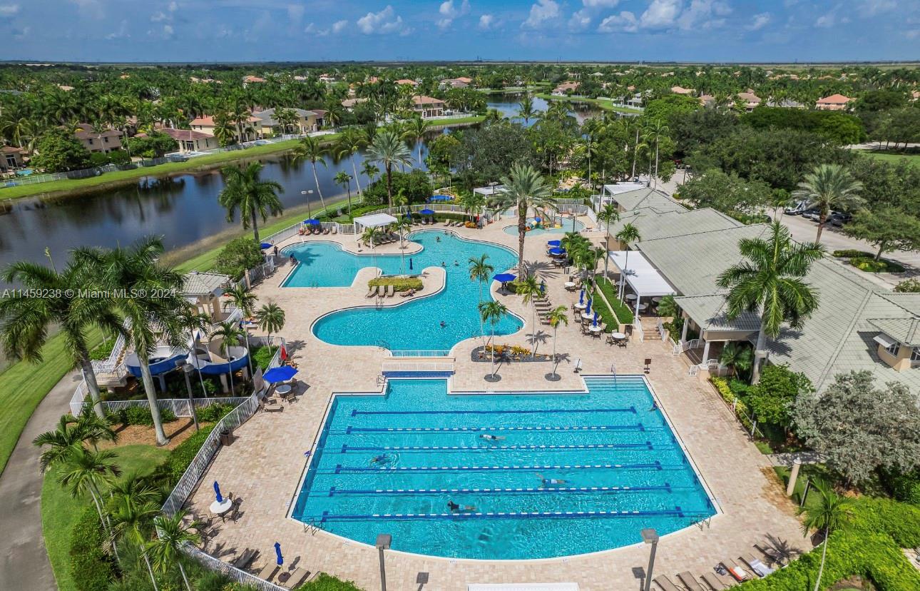 1509 Sunset Way Weston, FL 33327 - Photo 24 of 24 an aerial view of a house with a yard lake view and mountain view