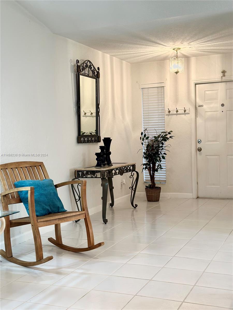 1509 Sunset Way Weston, FL 33327 - Photo 4 of 24 a view of a room with gym equipment