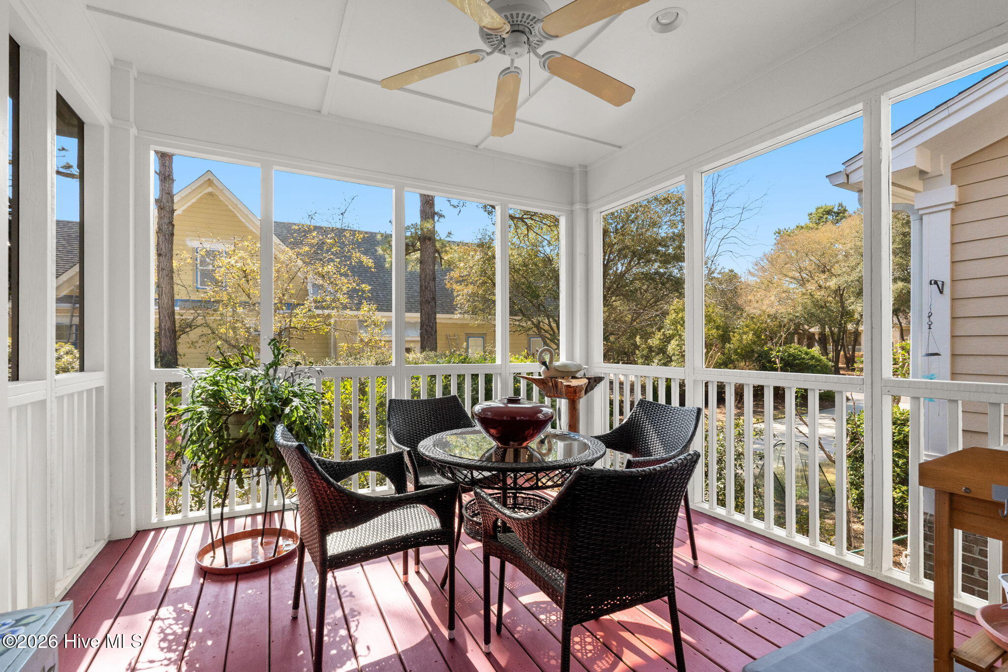 3684 Natchez Street Southwest Supply, NC 28462 - Photo 23 of 108 Screened porch off kitchen for dining al fresco