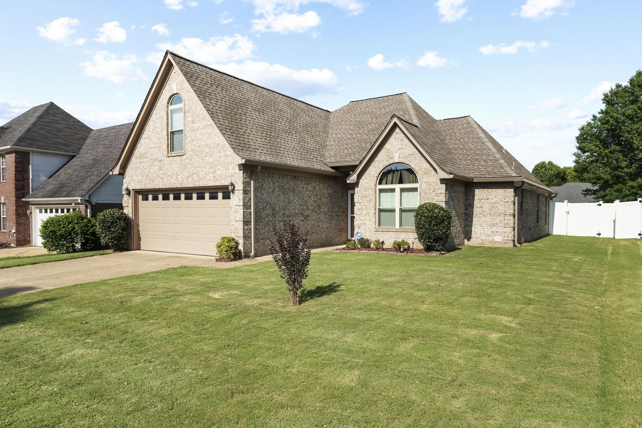 7232 Maple Grove Road Olive Branch, MS 38654 - Photo 18 of 18 View of front of property with brick siding, roof with shingles, driveway, and an attached garage