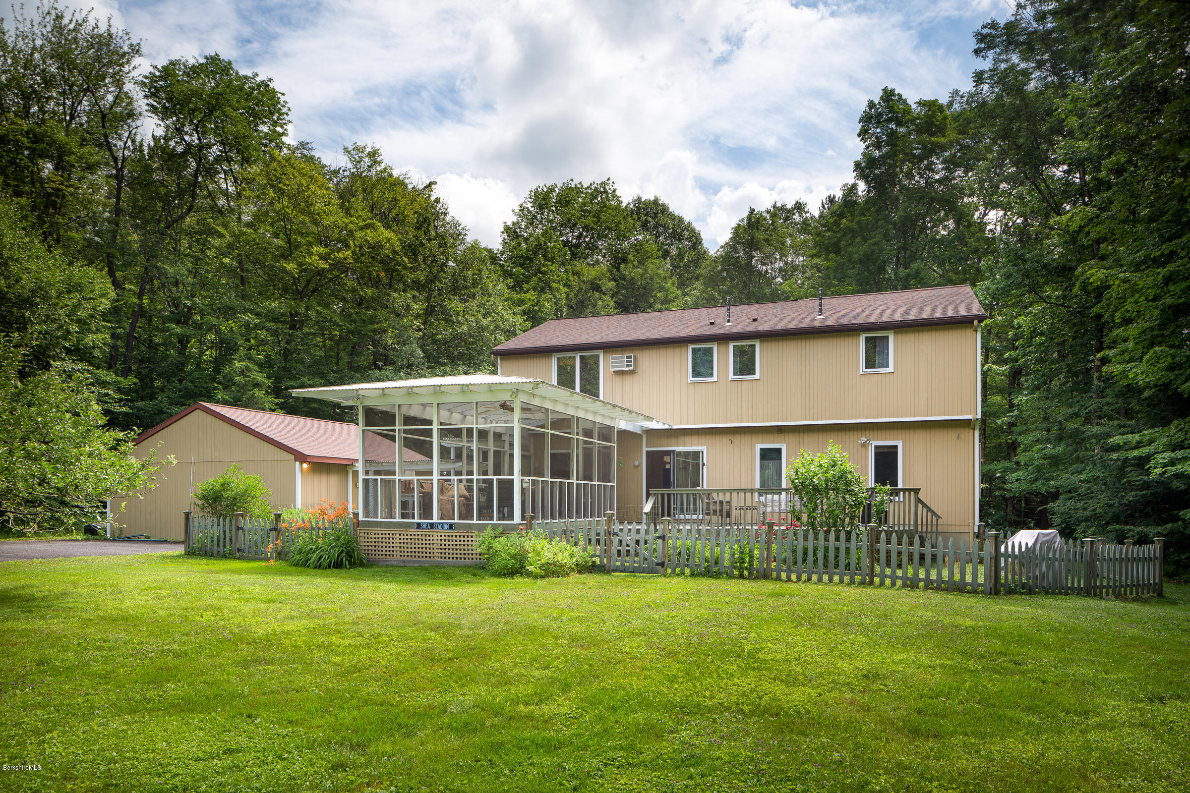 23 Griswold Road Monterey, MA 01245 - Photo 2 of 23 a view of a house with backyard and garden