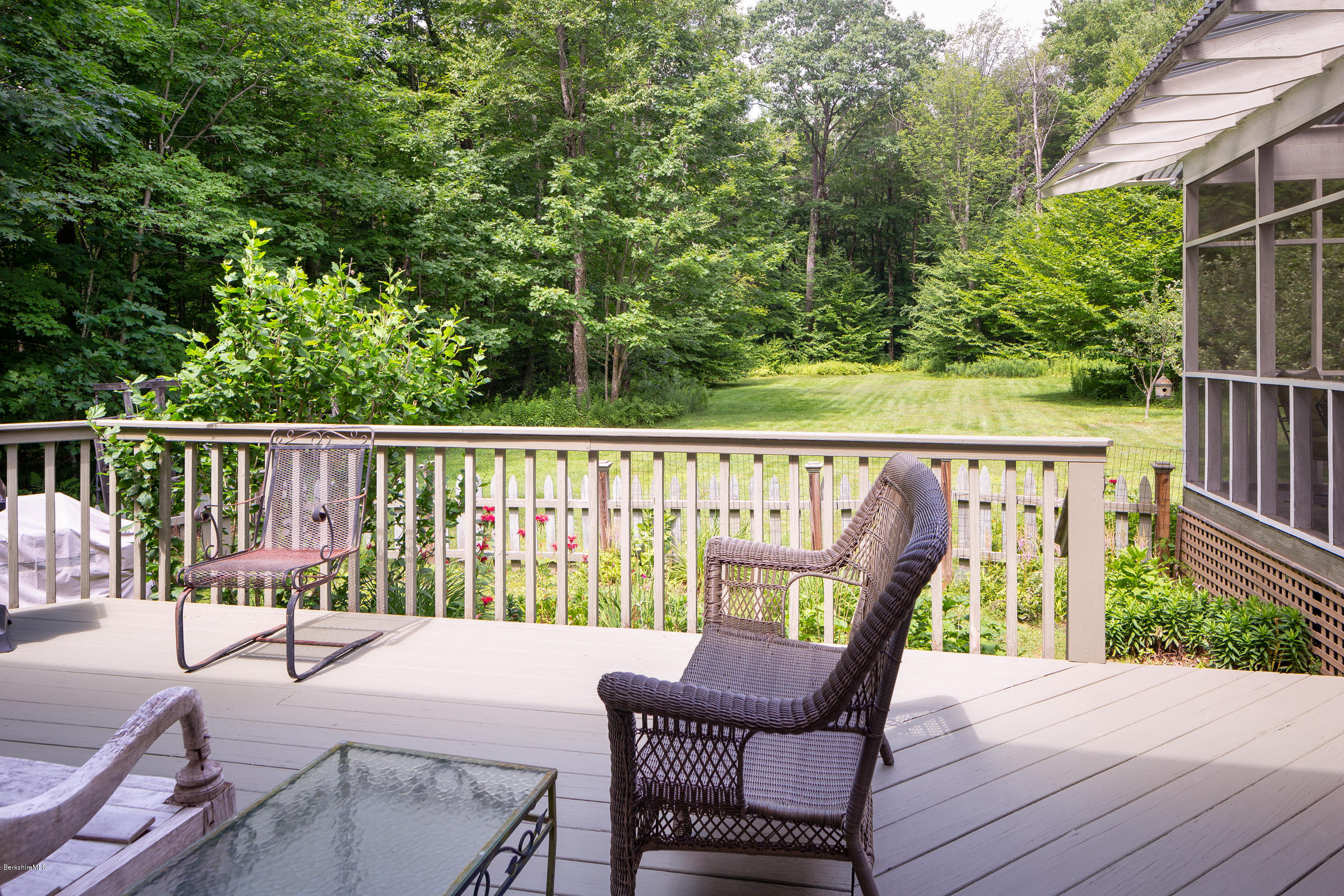 23 Griswold Road Monterey, MA 01245 - Photo 12 of 23 a balcony with wooden floor and outdoor seating