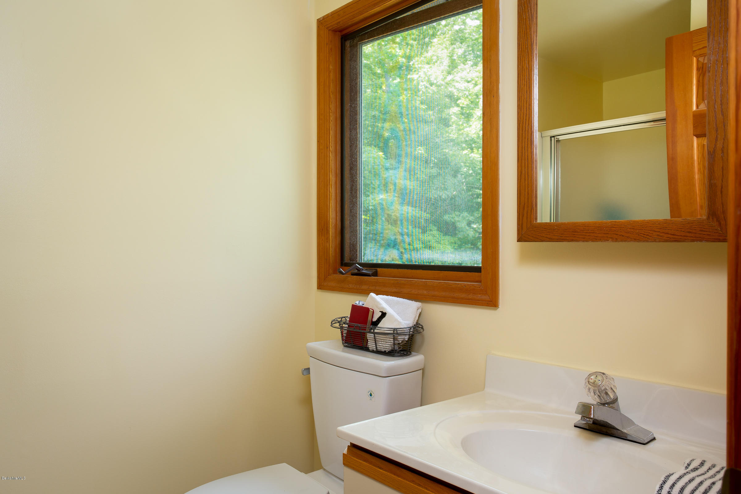 23 Griswold Road Monterey, MA 01245 - Photo 15 of 23 a bathroom with a sink toilet and a window