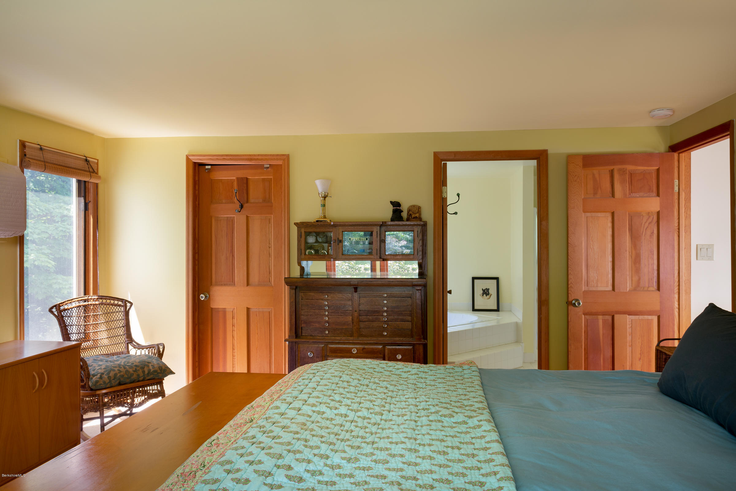 23 Griswold Road Monterey, MA 01245 - Photo 17 of 23 a bedroom with a bed and furniture