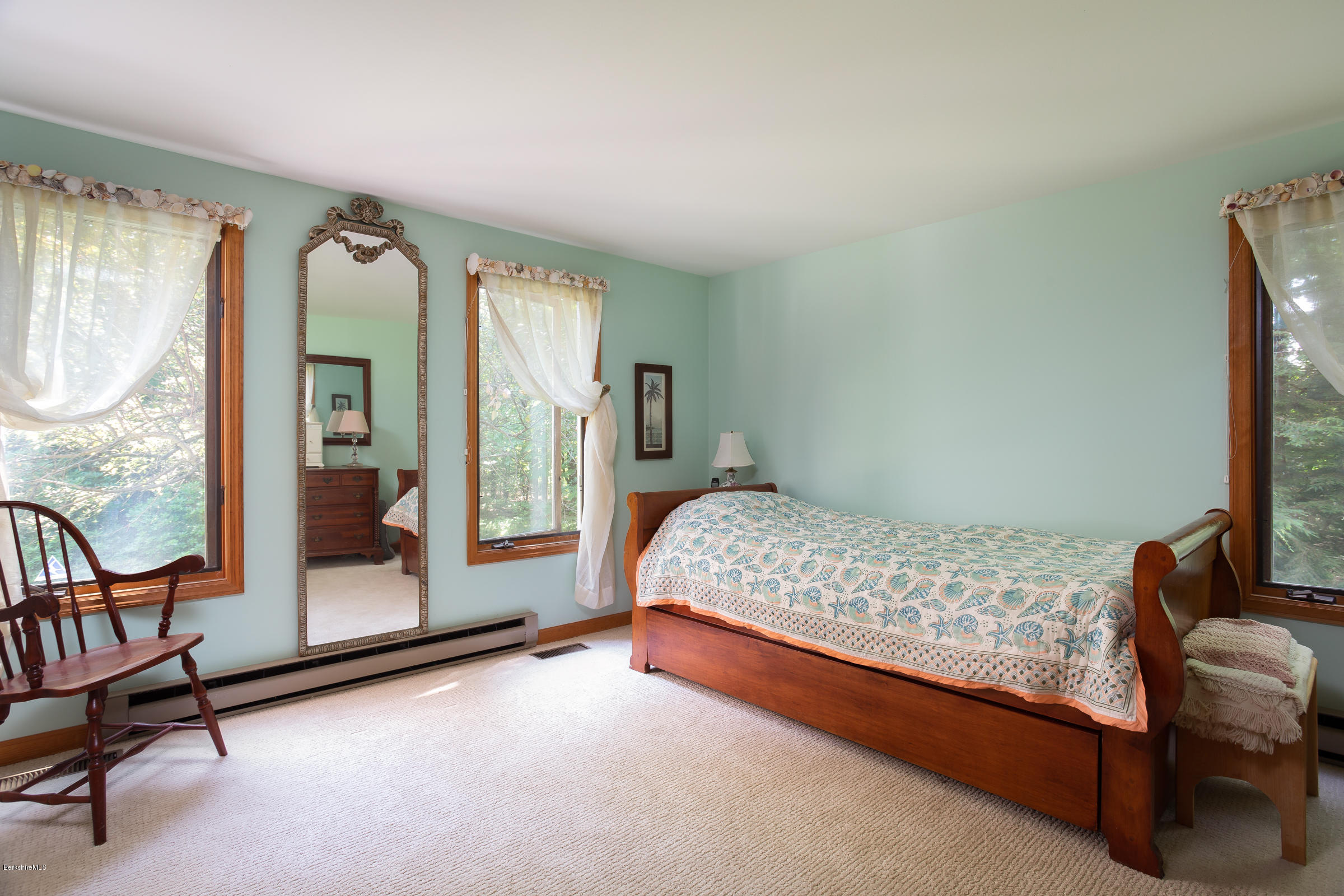 23 Griswold Road Monterey, MA 01245 - Photo 19 of 23 a bedroom with a bed and a window