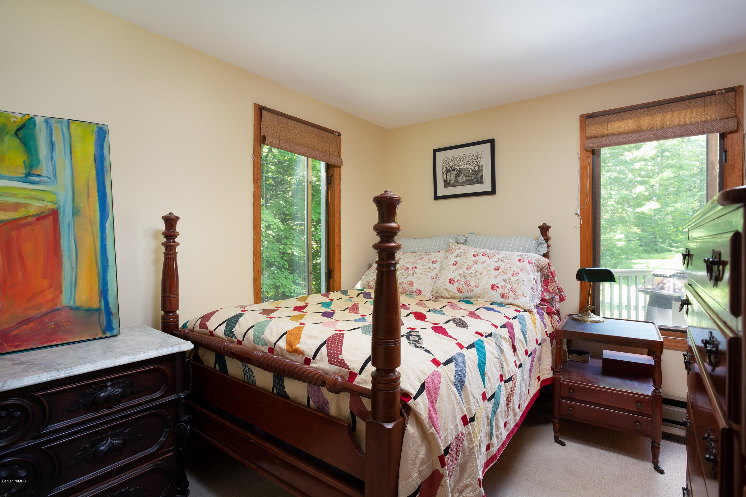 23 Griswold Road Monterey, MA 01245 - Photo 20 of 23 a bedroom with two beds and windows
