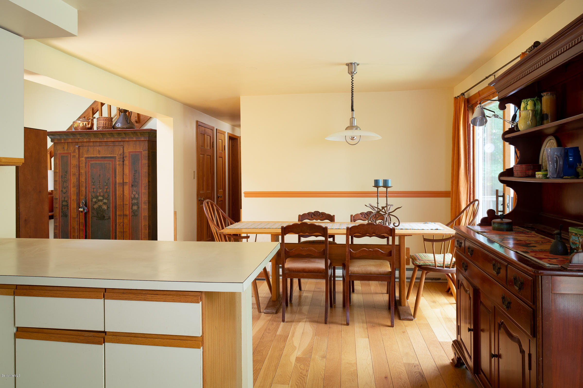 23 Griswold Road Monterey, MA 01245 - Photo 9 of 23 a dining room with furniture and wooden floor