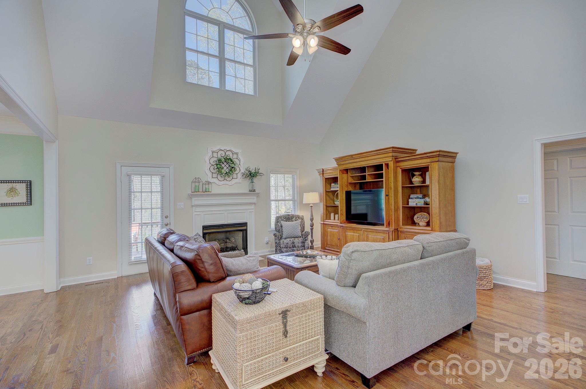 4839 Antioch Church Road Matthews, NC 28104 - Photo 15 of 36 a living room with furniture and a fireplace