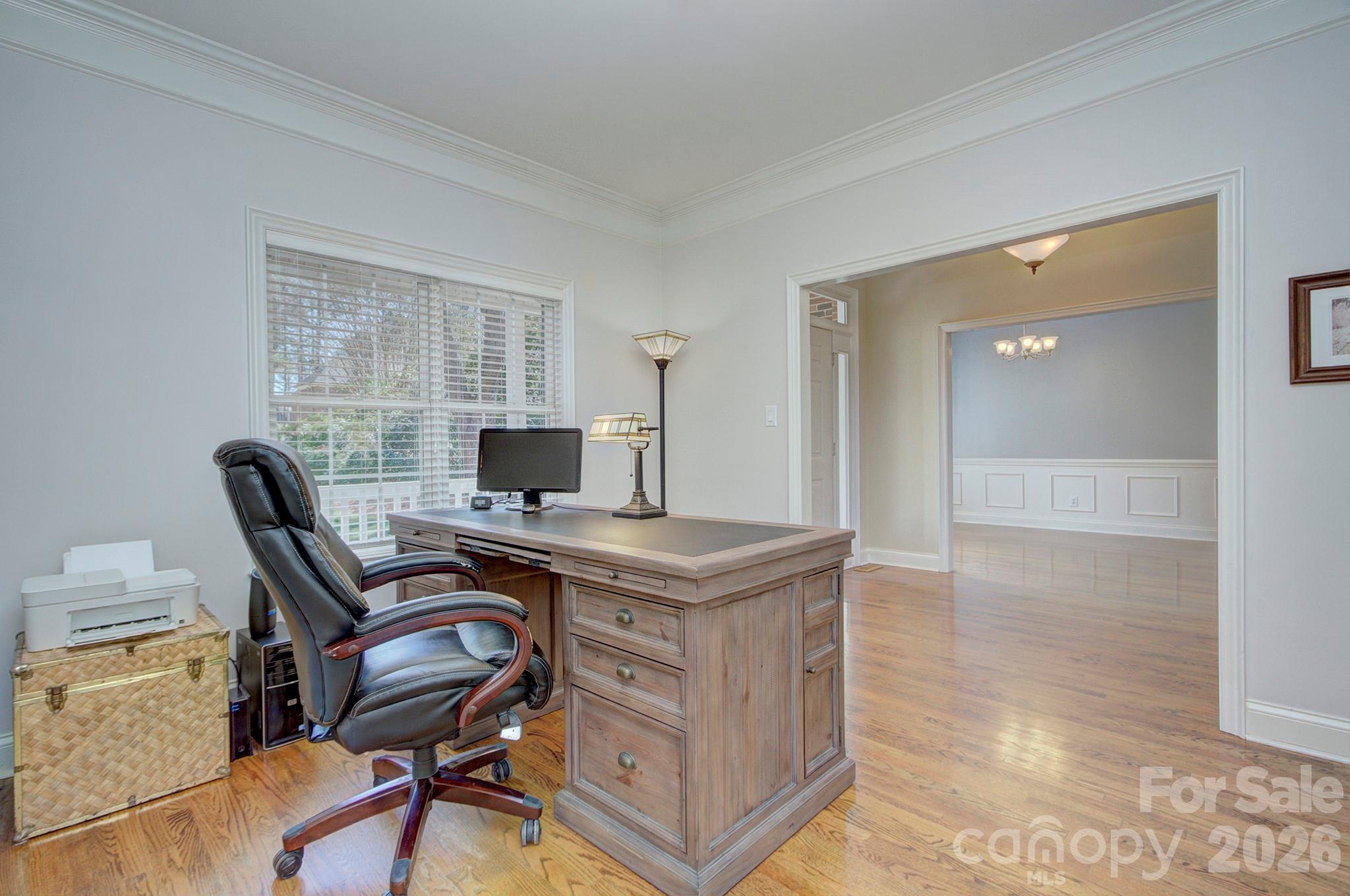 4839 Antioch Church Road Matthews, NC 28104 - Photo 22 of 36 a view of a workspace with furniture and a window