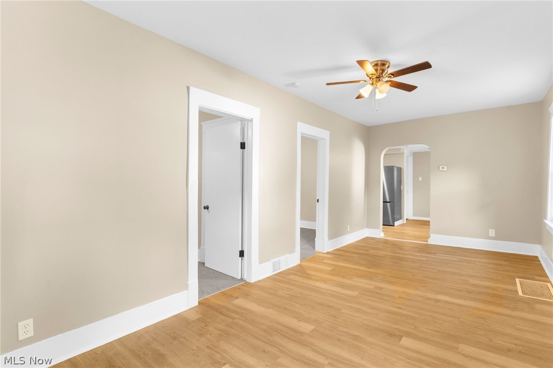 403 Mosier Road Girard, OH 44420 - Photo 21 of 22 Unfurnished room with ceiling fan and light hardwood / wood-style flooring