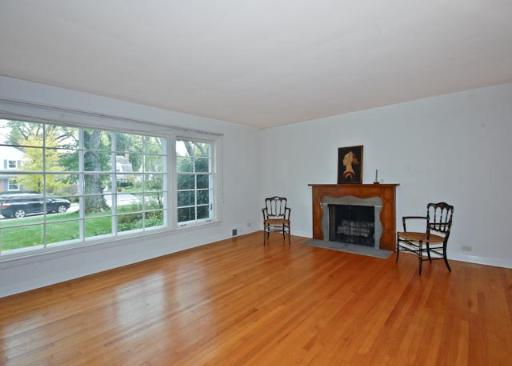 933 Pontiac Road Wilmette, IL 60091 - Photo 4 of 16 a living room with furniture and a fireplace
