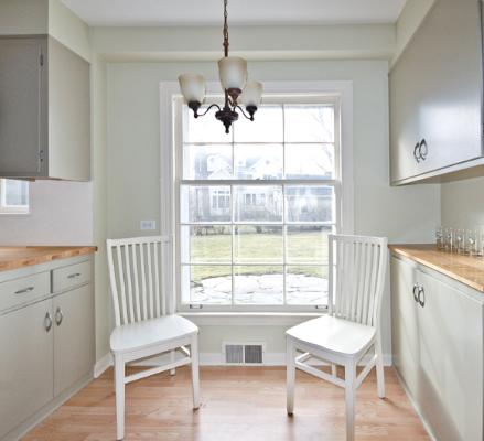 933 Pontiac Road Wilmette, IL 60091 - Photo 6 of 16 a living room with wooden floor and a window