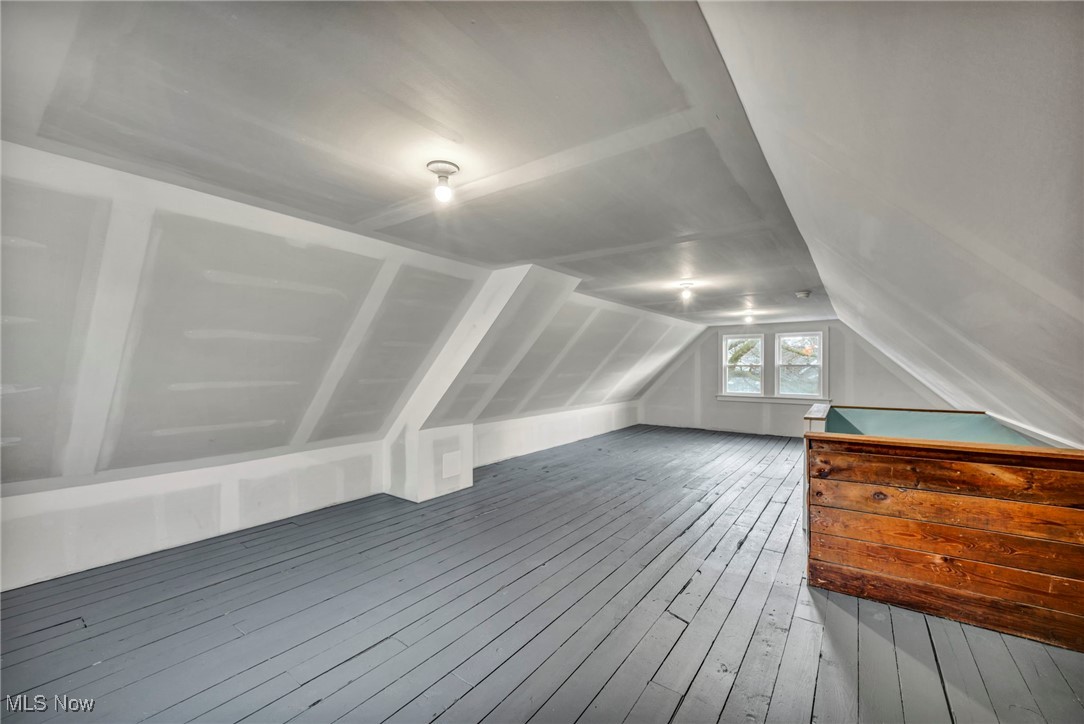 1610 Spring Road Old Brooklyn, OH 44109 - Photo 28 of 38 Additional living space featuring lofted ceiling and hardwood / wood-style flooring