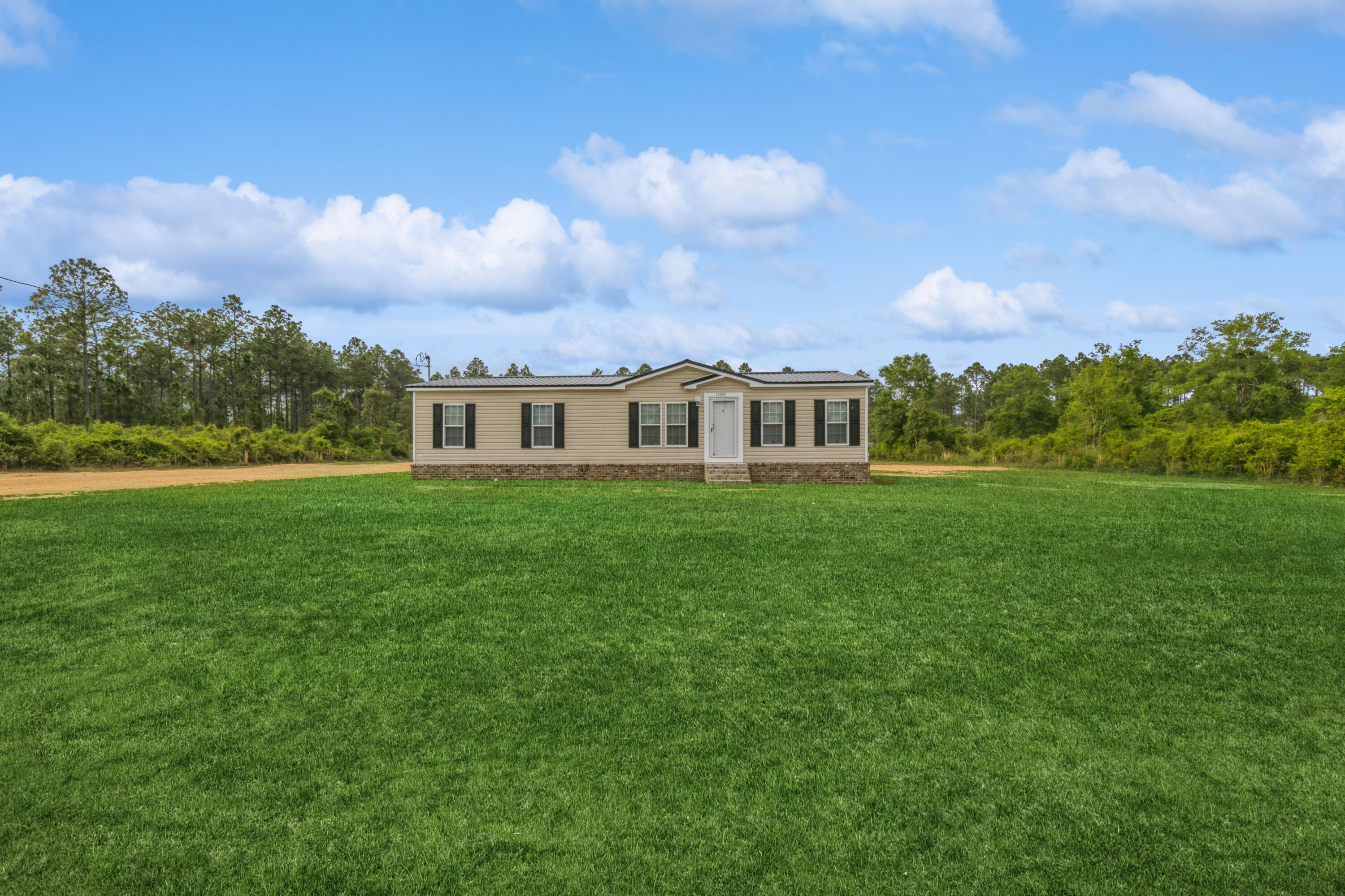 12692 Red Cloud Road Baker, FL 32531 - Photo 1 of 35 Front