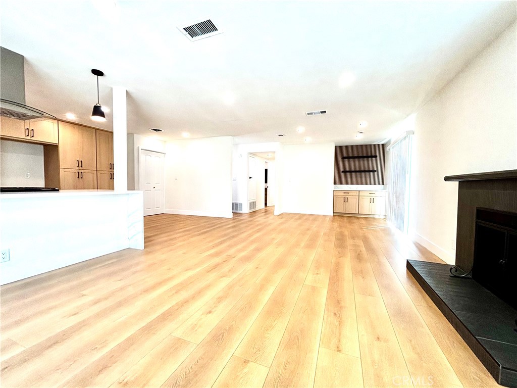 6210 Halstead Avenue, Unit A Rancho Cucamonga, CA 91701 - Photo 25 of 32 a spacious bathroom with a tub and mirror