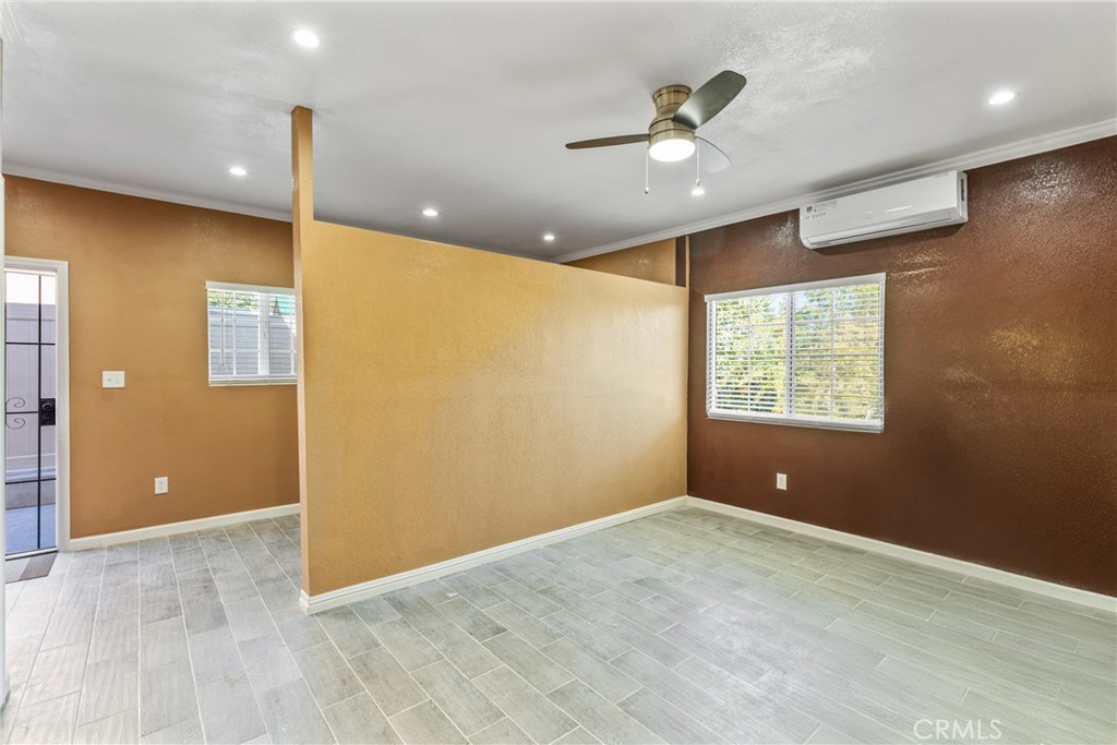 18458 Hidden Ranch Road Riverside, CA 92508 - Photo 20 of 30 an empty room and window in a room