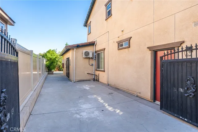 a view of a street with a garage