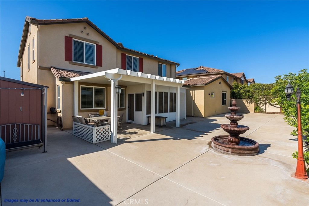 18458 Hidden Ranch Road Riverside, CA 92508 - Photo 26 of 30 a front view of a house with a garden