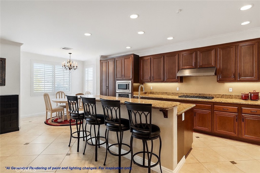 18458 Hidden Ranch Road Riverside, CA 92508 - Photo 5 of 30 a kitchen with granite countertop a table chairs stove microwave and cabinets
