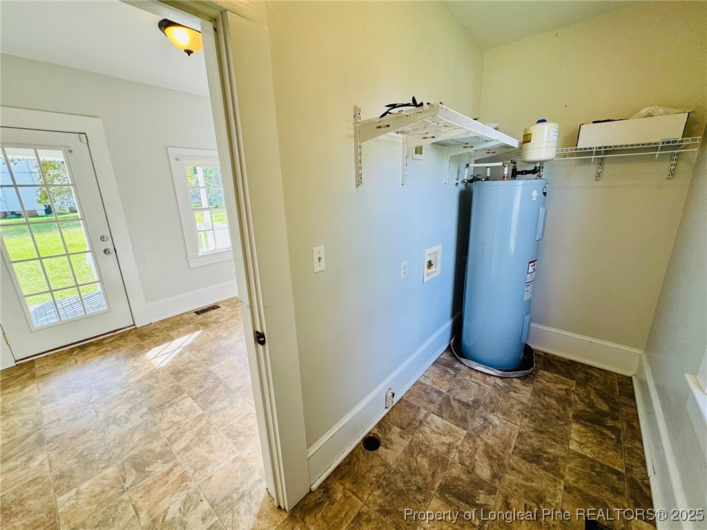 907 Caldwell Street, Unit A Lumberton, NC 28358 - Photo 12 of 24 a view of a room with door