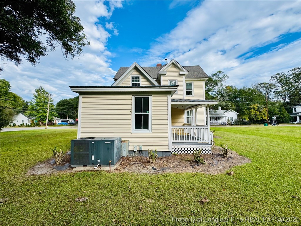 907 Caldwell Street, Unit A Lumberton, NC 28358 - Photo 23 of 24 a front view of house with yard and green space