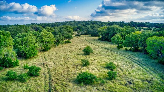 a view of a lake with a building in the back