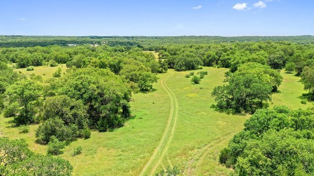 a view of a garden with an outdoor space