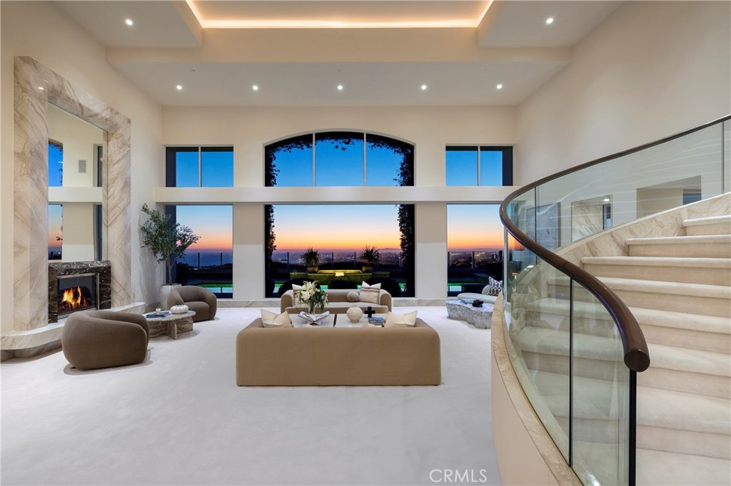 3 Seashell Newport Coast, CA 92657 - Photo 1 of 36 a lobby with furniture and stairs