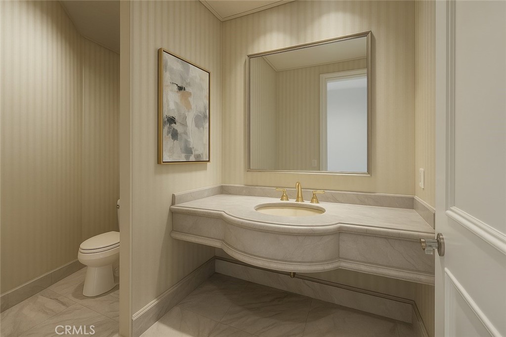 3 Seashell Newport Coast, CA 92657 - Photo 25 of 36 a bathroom with a toilet sink and mirror