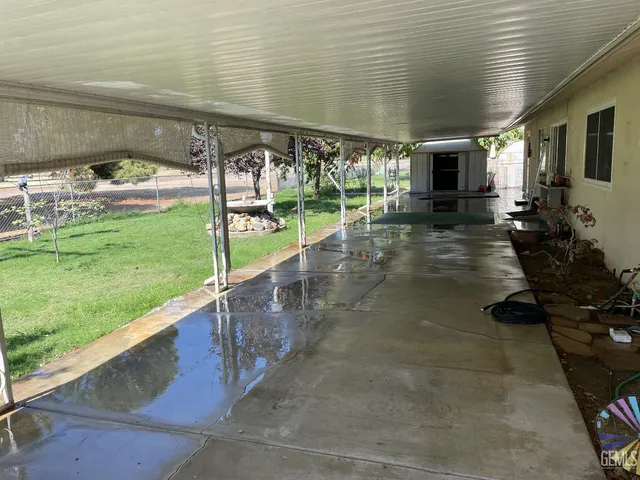 a view of a porch with furniture