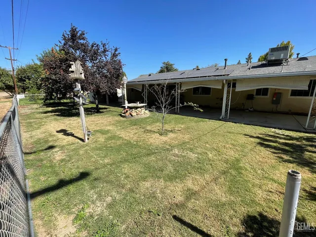 a close up of a flower in a garden